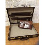 A Jensen briefcase, interior with arrangement of pockets, measures 37cm x 47cm x 9cm along with a