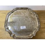 A 1933 Sheffield silver footed tray with inscription to centre, measures 34cm x 34cm, weighs 1100