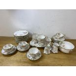 A Haviland Limoges 38 pc tea set including ten teacups, measure 5cm high, eleven saucers, twelve