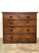 A Victorian mahogany chest, fitted with two short and three long graduated drawers, raised on