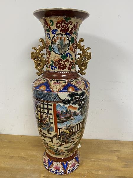A Japanese inspired baluster shaped vase with gilt handles to sides, no marks to base, measures 61cm