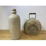 An early 20thc Old Fulham Pottery hot water bottle of circular form with swing handle, inscribed The
