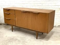 McIntosh, A mid century teak sideboard, fitted with three drawers and twin doors enclosing a