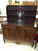 A Napoleon III transitional gilt metal mounted mahogany combination commode and travelling wash