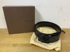 A Louis Vuitton black checkered leather belt marked 90/36, with metal buckle and original box and