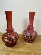 A near pair of late 19th early 20thc cranberry glass vases, each measures 25cm high