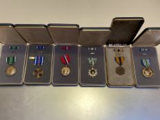 United States of America. Six cased medals including Air Force Commendation medal named to F L