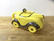 A novelty Sadler china teapot of a racing car, (12cm h)