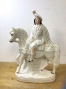 A Staffordshire flatback figure, gentleman riding horse with stag (38cm high)