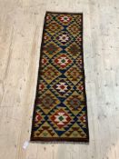 A Maimana kilim runner rug of geometric design, 193cm x 61cm
