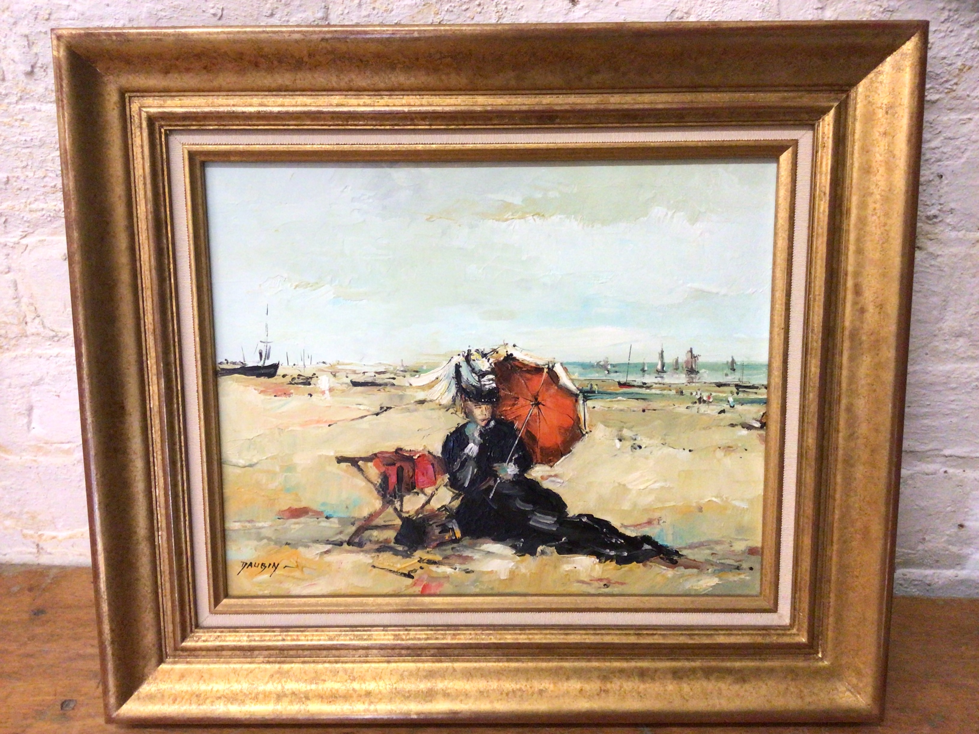 Daubin, woman reclining on French beach under parasol, oil, signed bottom left, inscriptions