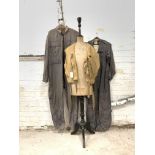 WWII period flap life jacket and two later flying suits