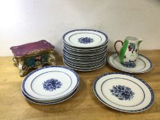 A set of fourteen china side plates, floral decoration to well, impressed with L to base ? (21cm d),