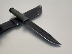 USA Vietnam period jungle knife, plastic green handle, blacked blade, black leather scabbard