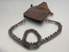 British Military hand coil chain saw with two handles and sharpening tool, in original leather case