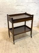 An oak drinks trolley, circa 1940's, the tray top over drawer, raised on square section supports and