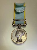 1854-56 British Crimea medal with a Sebastopol clasp. Naming erased, suspender re-affixed