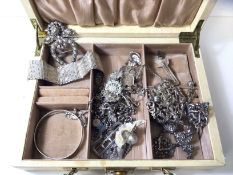 A jewellery box with quantity of white metal and silver jewellery including bangles, buckles,