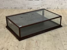 A late 19th/ early 20th century mahogany and pine counter top display case, with glazed top front