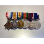 WWI trio and Police group of seven, 1914-15 Star, British War and Victory medal, Defence medal, 1953