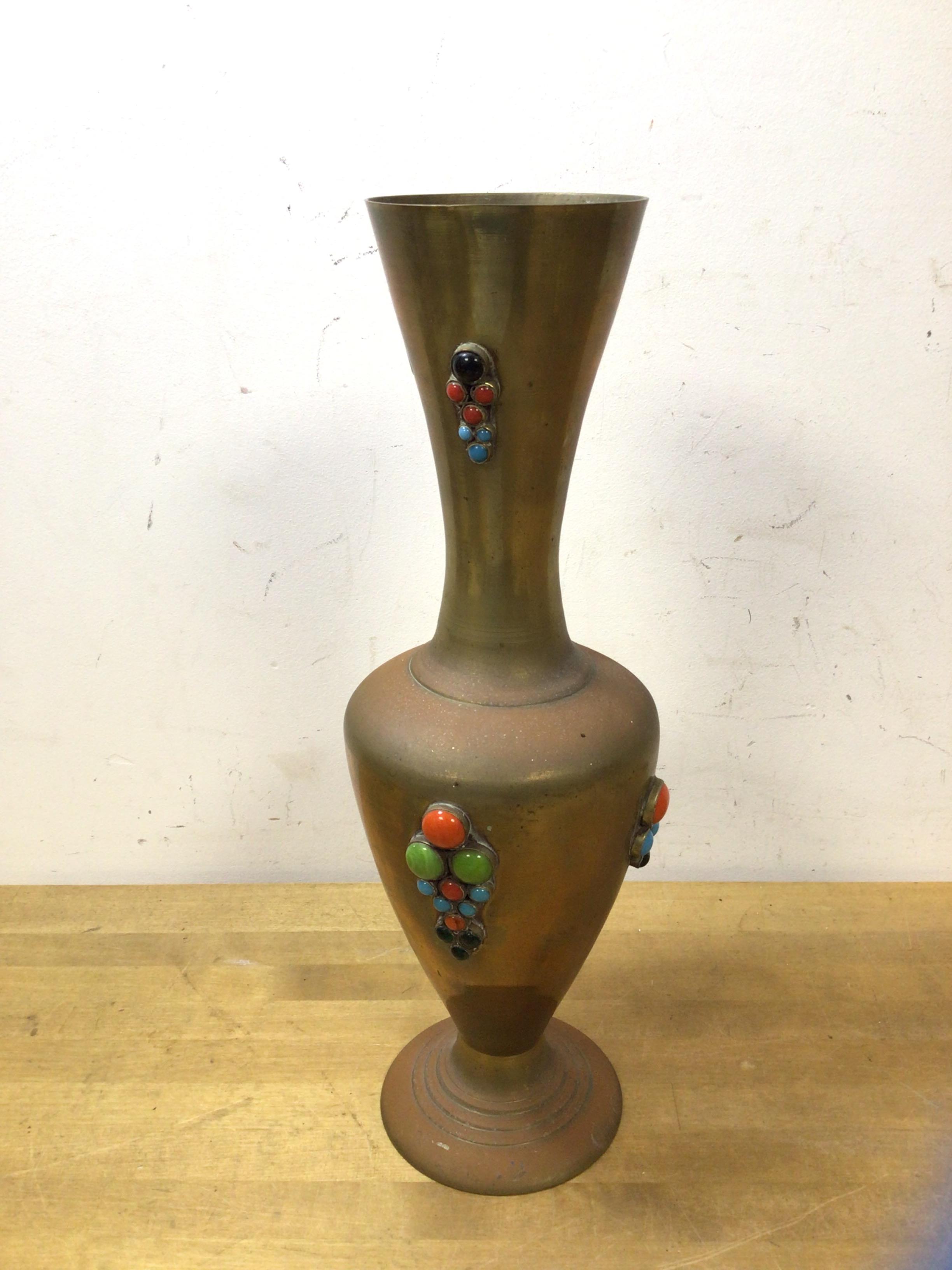 A brass vase with cabuchon decoration of baluster form (30cm high)