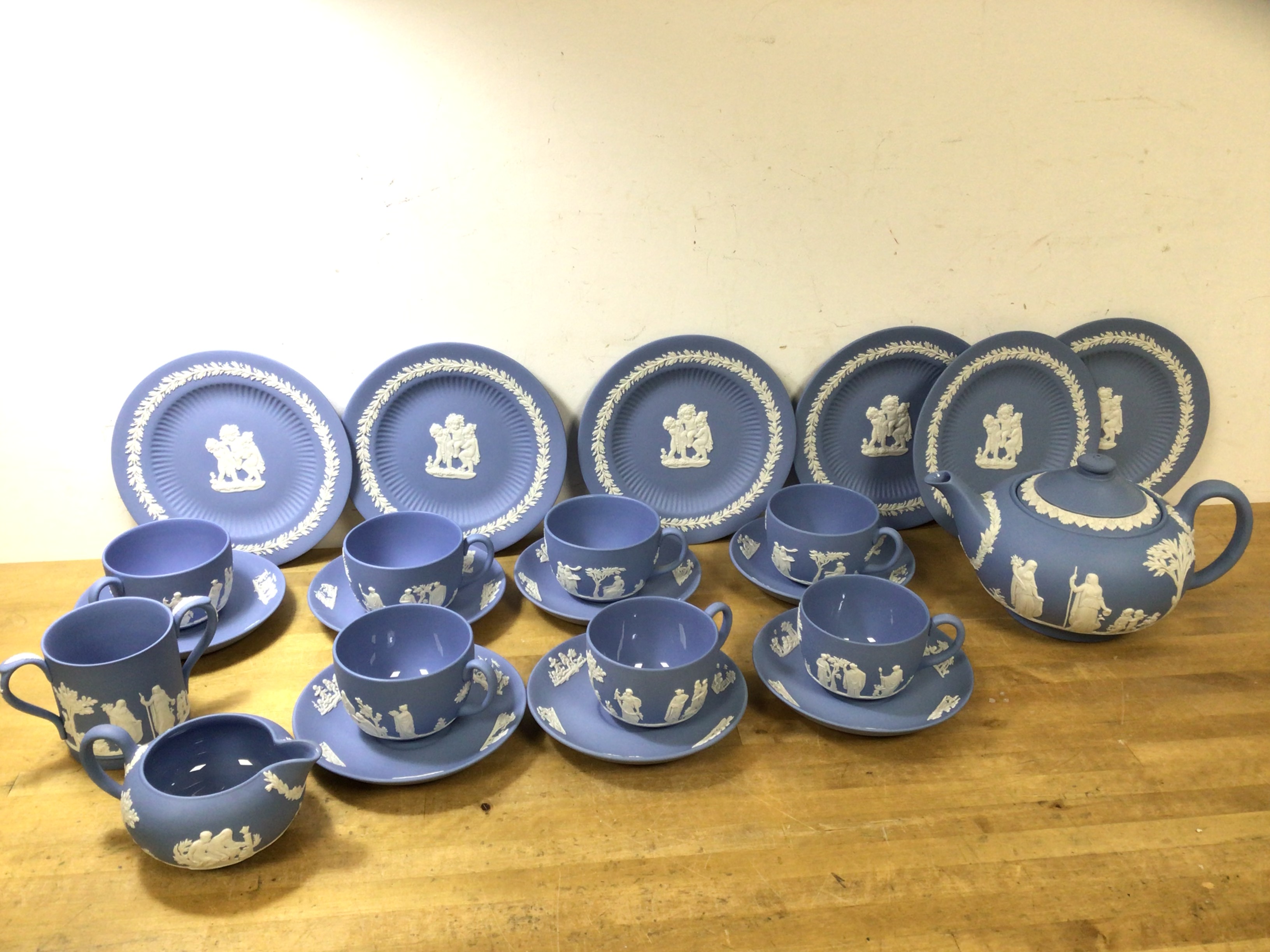 A Wedgwood Jasperware tea service including teapot (13cm h), seven teacups and saucers, six side
