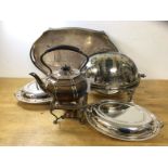 A quantity of Epns including kettle on stand, two serving dishes with lids, a dome top footed food