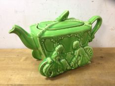 A vintage novelty china teapot, Cinderella, in the form of a carriage with slipper finial,