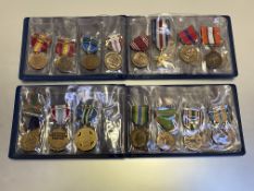 United States of America. Two medal folders containing 38 assorted campaign and service medals