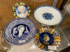 A Majolica footed plate with raised edge, portrait of lady to well, marked Faenza, below flower to