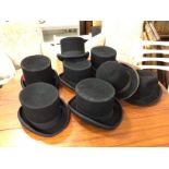 A collection of hats including coachman's, various sizes (8)