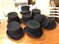 A collection of hats including coachman's, various sizes (8)