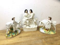 A group of Staffordshire figures including a courting couple (23cm h) and two of a man and woman