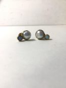 A pair of stud earrings marked 9ct with cultured pearl and opal, each earring (1.5 cm high)