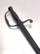 An 18thc spadroon, steel fluted pommel and guard, wound copper grip, street steel blade with