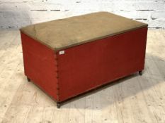 A Late 19th century pine ottoman, the sides covered in original studded red fabric, raised on