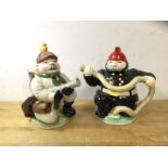 Two vintage novelty china teapots, one in the form of a fireman, label to base Roy Simpson for J