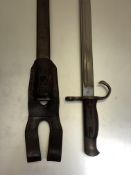 A Japanese model 1897 bayonet, steel scabbard and leather frog