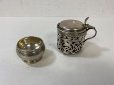 A silver condiment pot, Sheffield 1900, (6.5cm high) with blue glass insert, a 19thc French silver