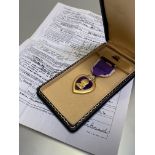 United States of America. Cased Purple Heart, named to John G Lockard U.S.M.C. in coffin style