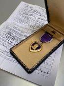 United States of America. Cased Purple Heart, named to John G Lockard U.S.M.C. in coffin style