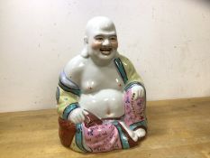 A laughing Buddha, (23cm h), no marks to base