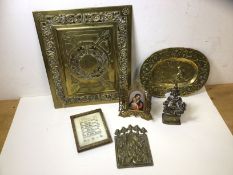 A mixed lot including an oval brass tray, brass pierced panel with cipher to centre, a devotional