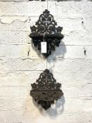 A pair of 20th century cast iron wall brackets of openwork floral design, H35cm, W26cm, D16cm