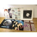 A collection of six records including David Bowie, John Lennon, Robert Plant, Rolling Stones (2),