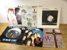 A collection of six records including David Bowie, John Lennon, Robert Plant, Rolling Stones (2),