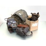 WWII British baby's gas mask and lady's respirator in brown leather, handbag style case, four