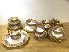 A set of ten third quarter of the 19thc English teacups, eleven saucers, twelve side plates, sugar