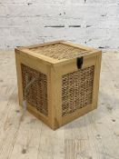 A Fortnum and Mason varnished pine lidded box with basket work panels and rope handles to each