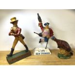 A group of alcohol mascot items including Johnny Walker, polychrome composition figure, (41cm h),